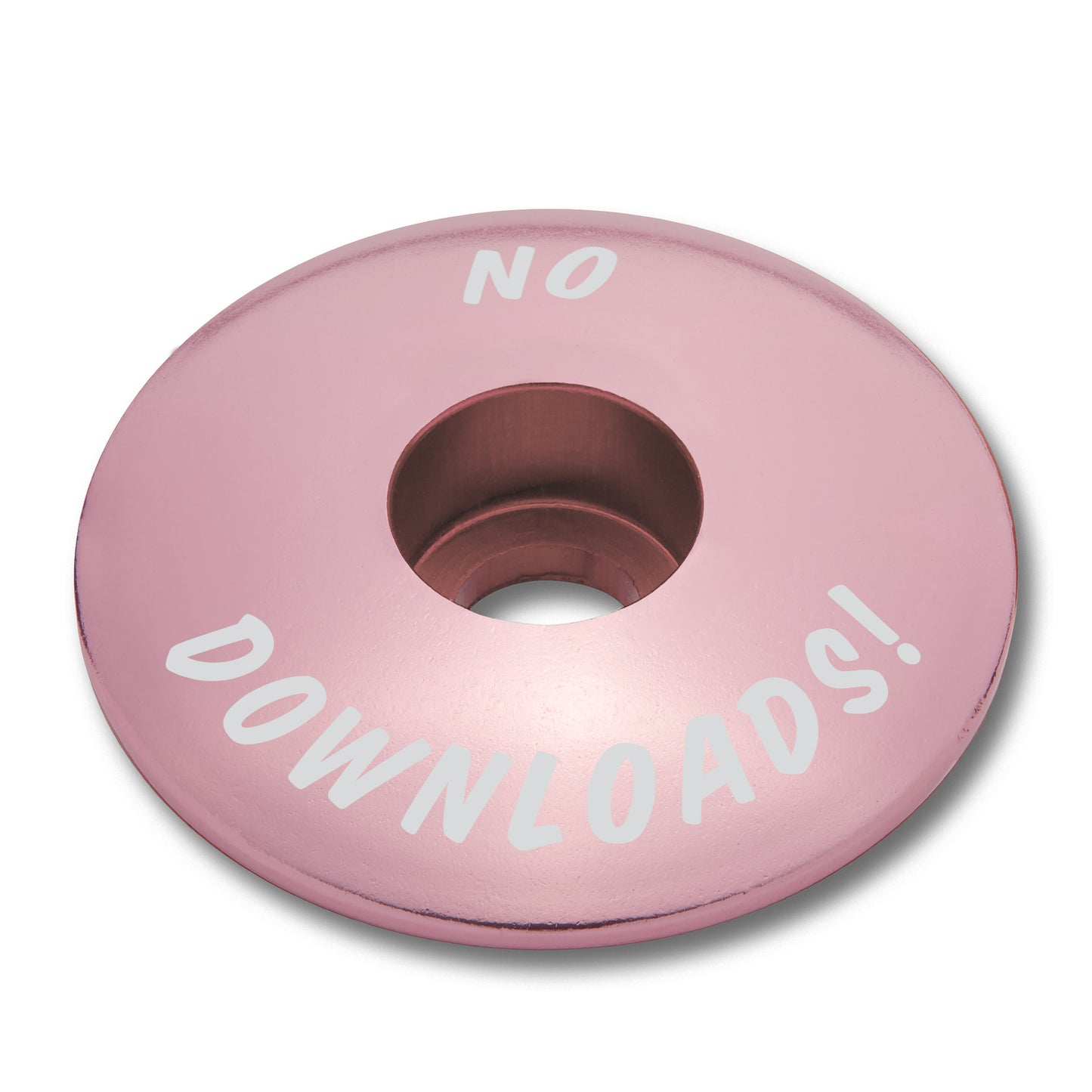 Pink stem top cap with 'Grip and Rip' detail enhances bike aesthetics and functionality.