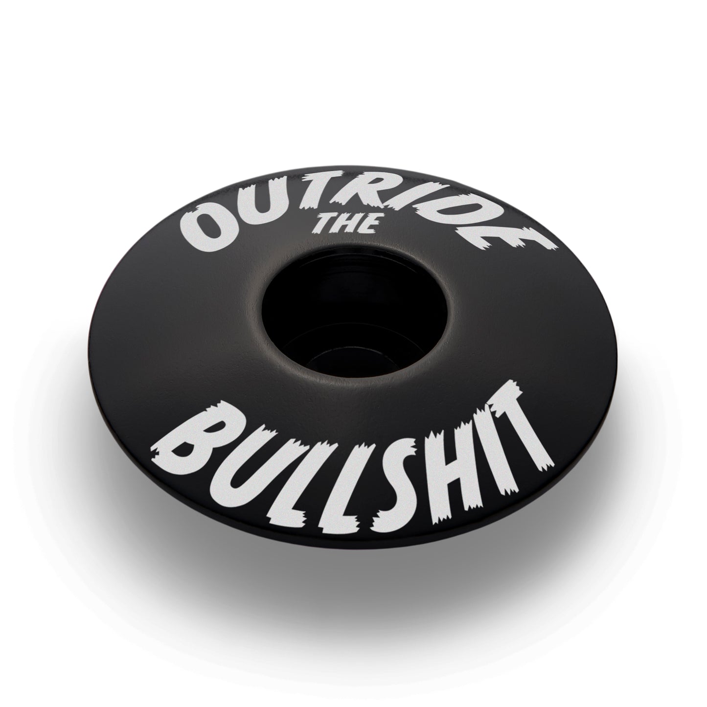 Black bicycle headset cap for mountain or road bikes.