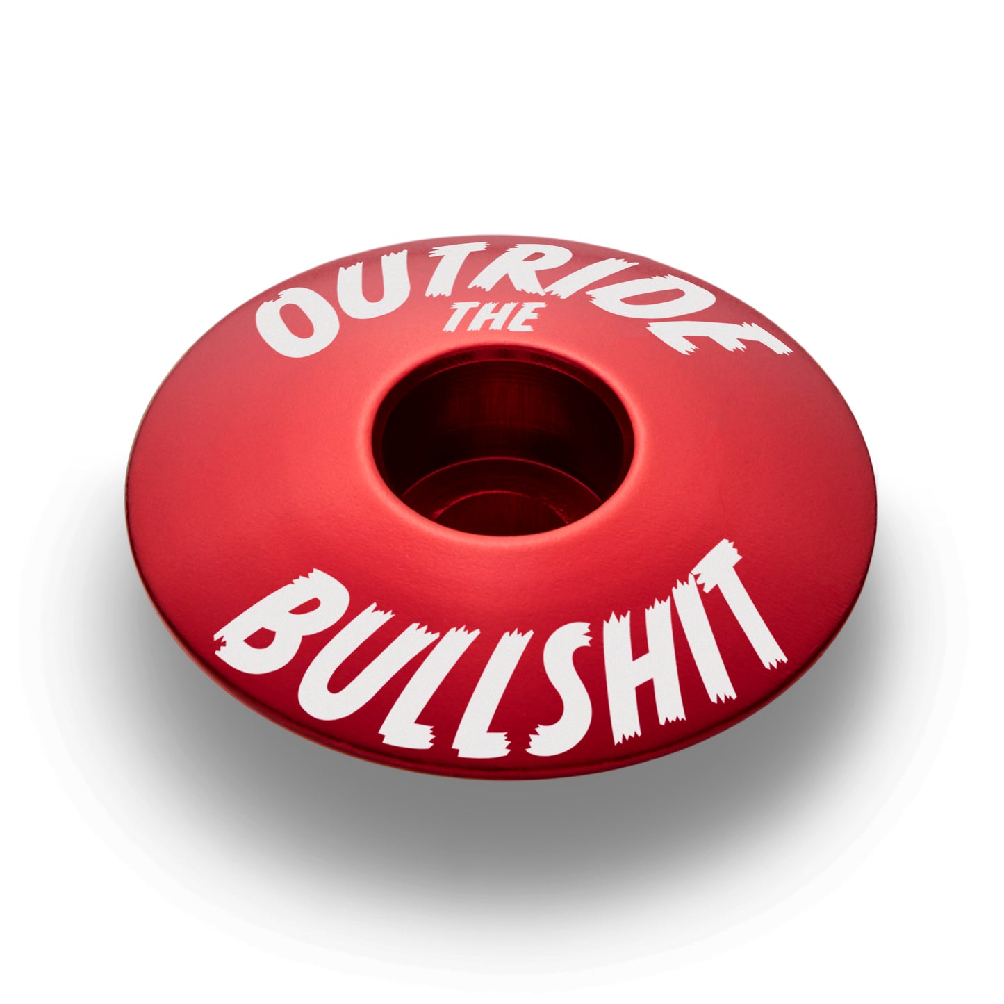 Red bike stem cap for custom bicycle accessories.