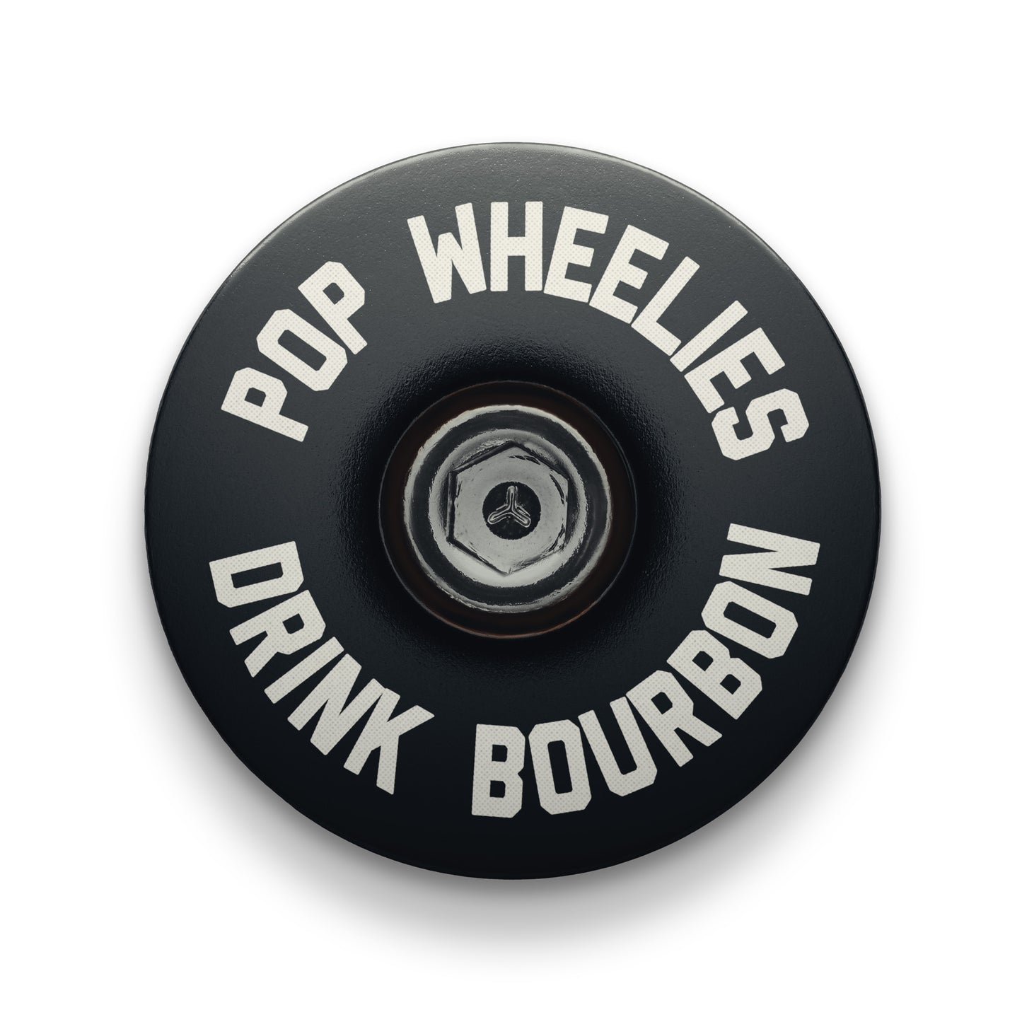 Black bicycle headset cap designed for modern bikes with a lightweight aluminum build.