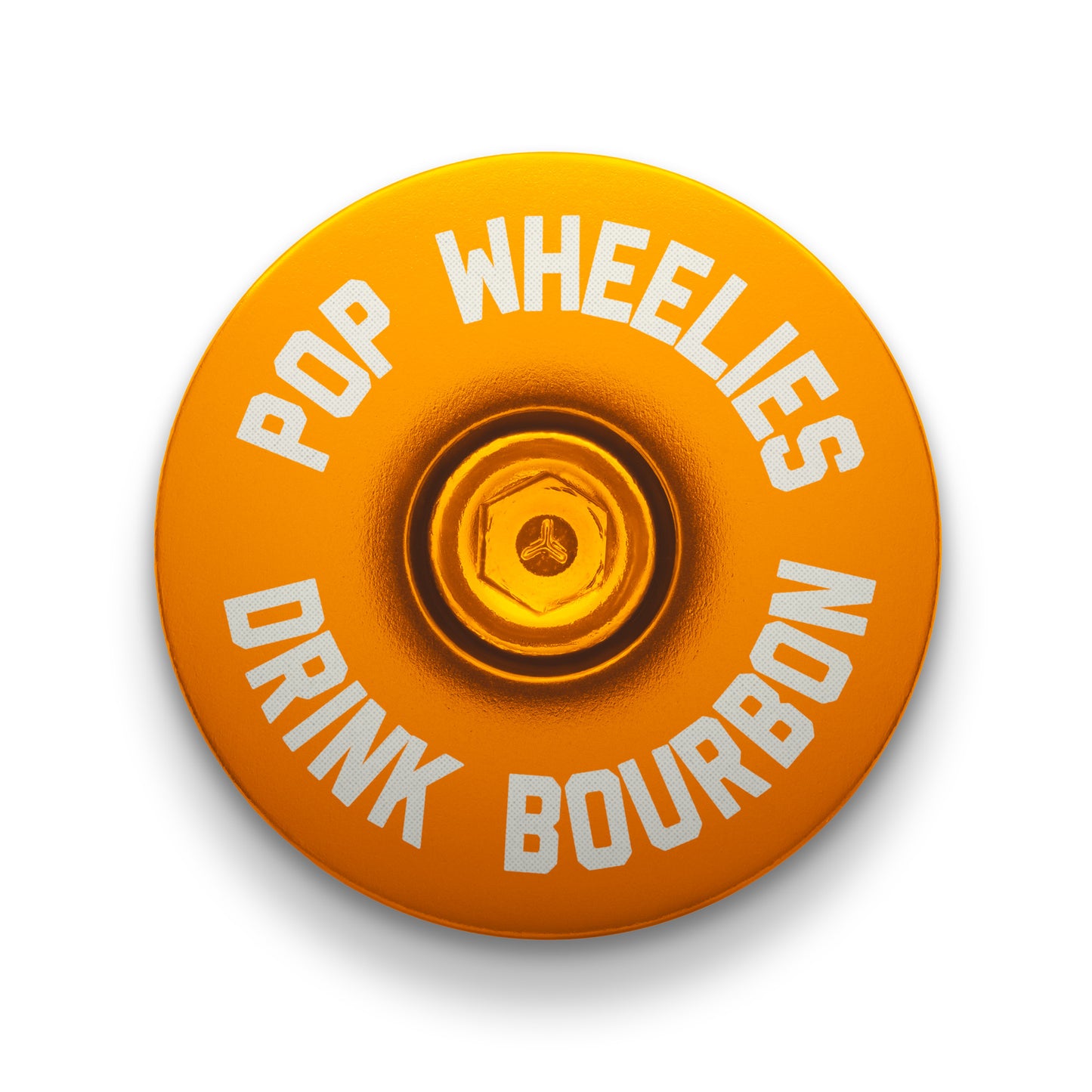Gold bike stem cap for a bright and personalized bike setup upgrade.