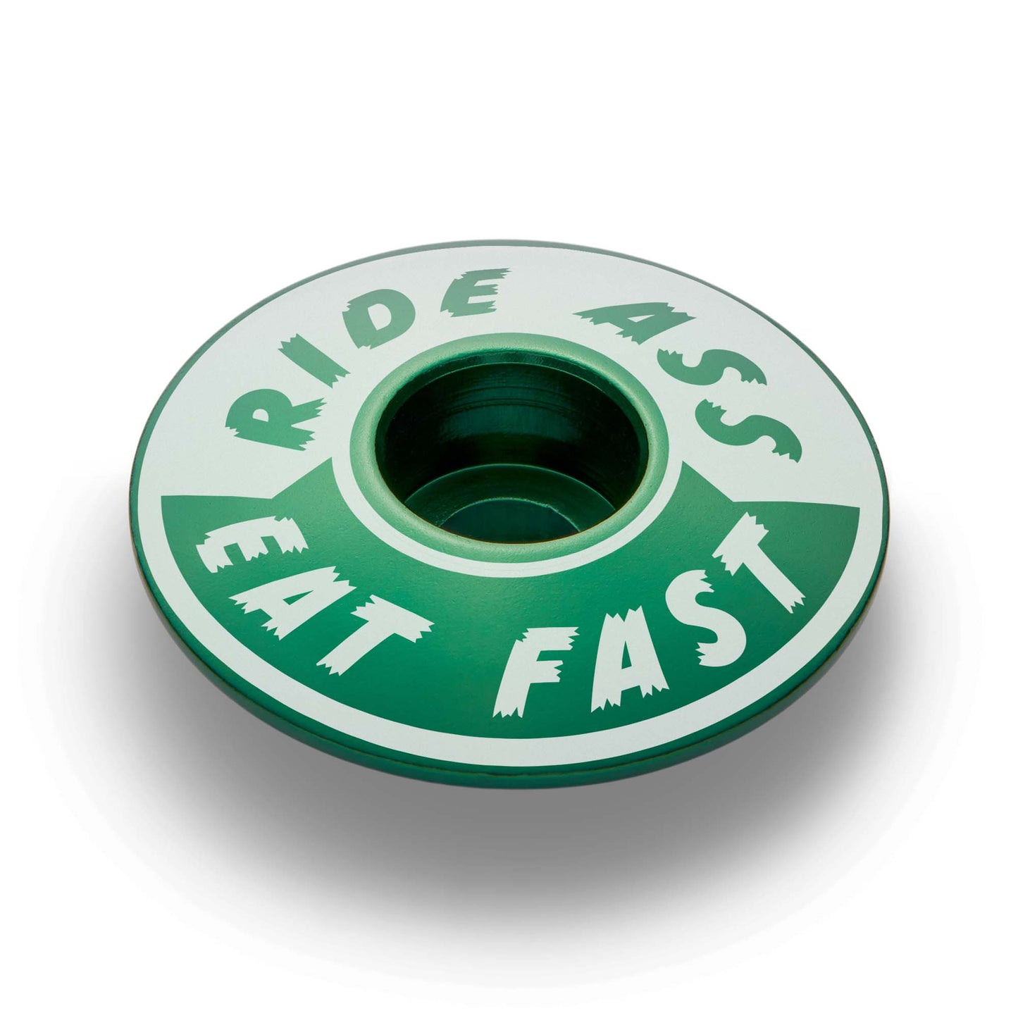Dark green Ride Ass Eat Fast bike headset cap for 1 1/8 steerer tubes adds personality to your bicycle top cap.