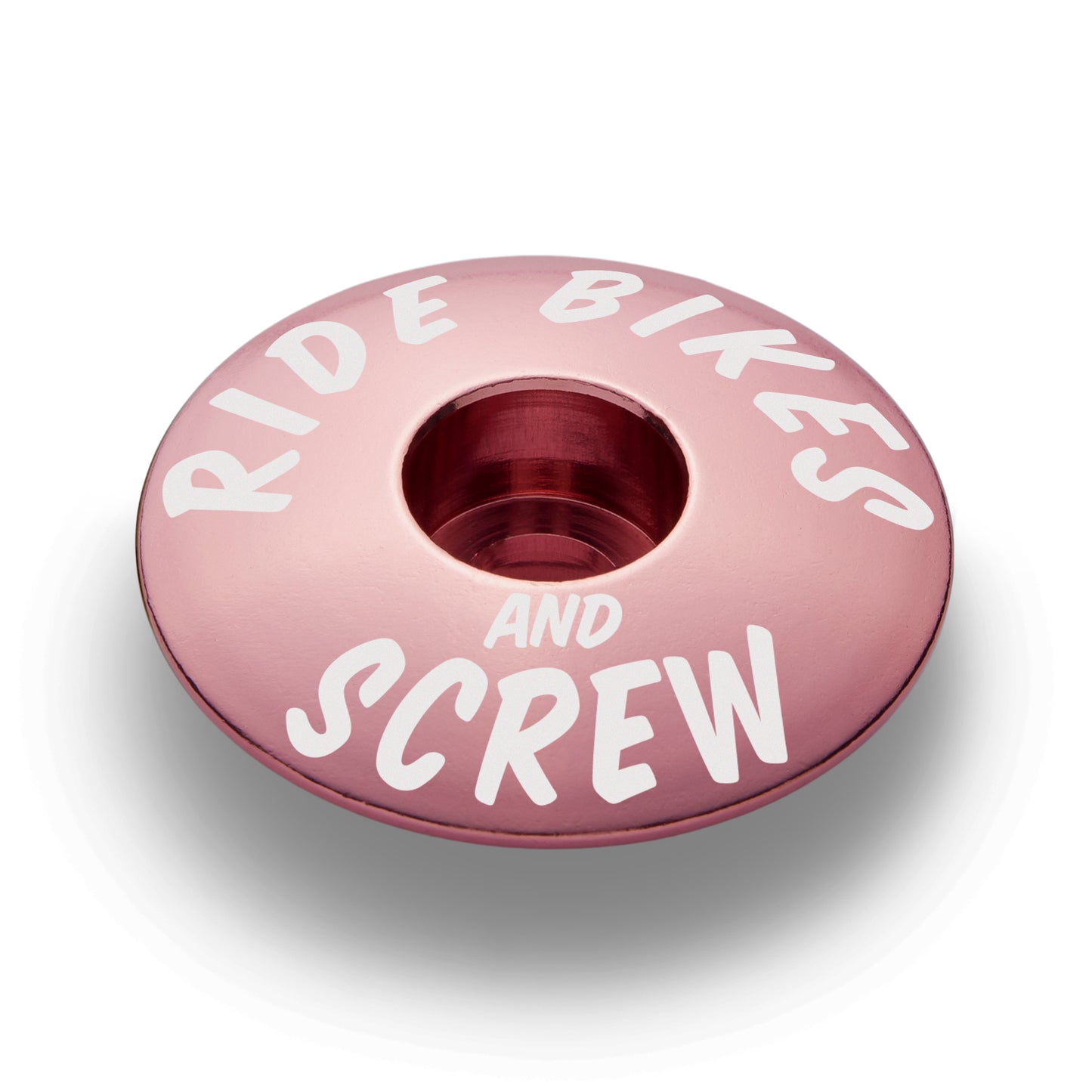 Pink stem top cap made for 1 1/8" steerer tube adds a colorful custom detail to your bike.