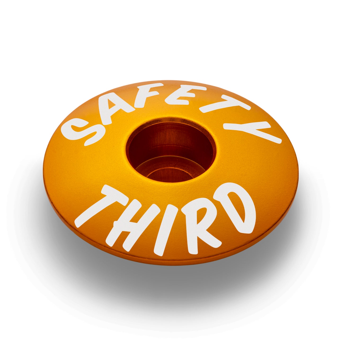 Gold bike headset top cap, designed for 1 1/8" tubes with a clean and polished finish.