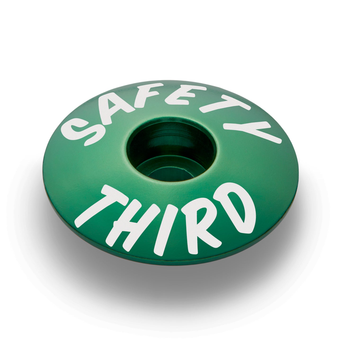 Dark green headset cap designed for bikes with 1 1/8" steerer tubes and a strong aluminum build.