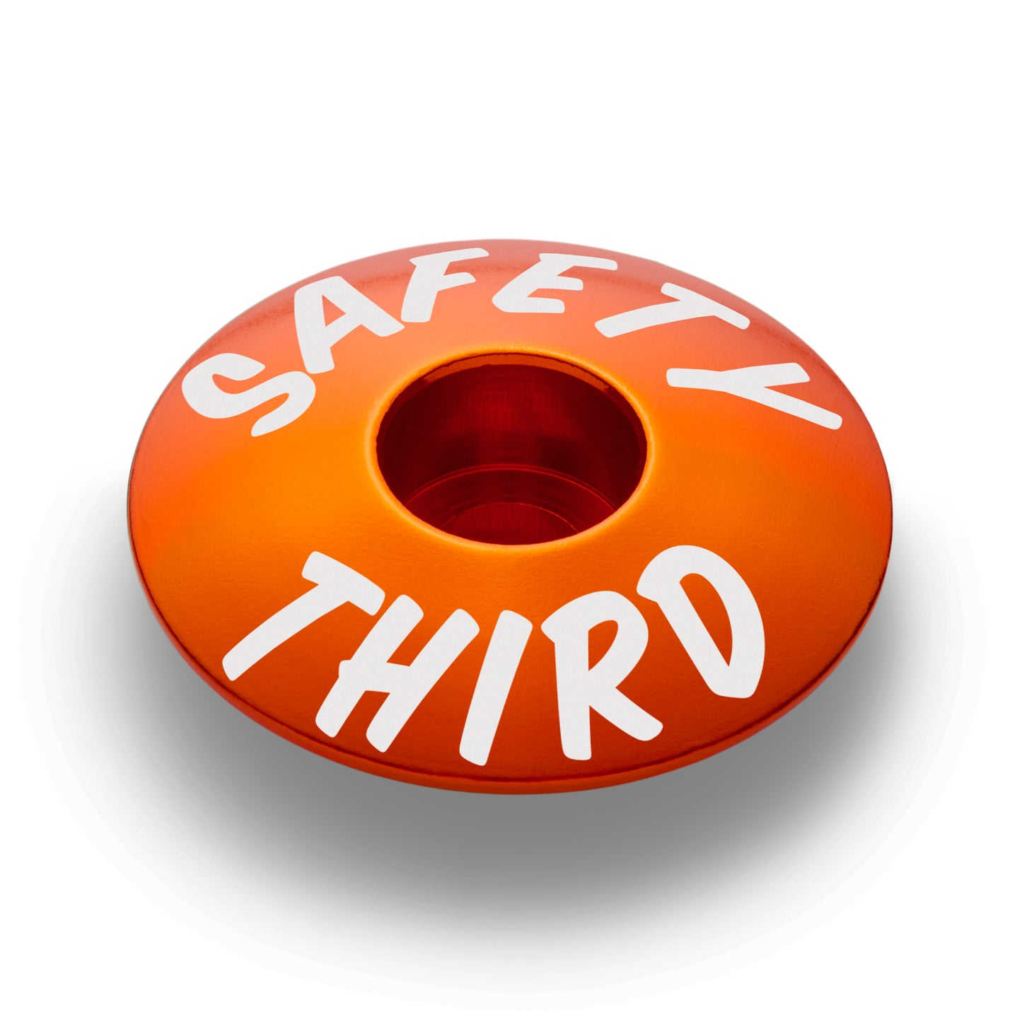 Orange bike headset top cap designed to fit 1 1/8" steerer tubes and complement your bike setup.