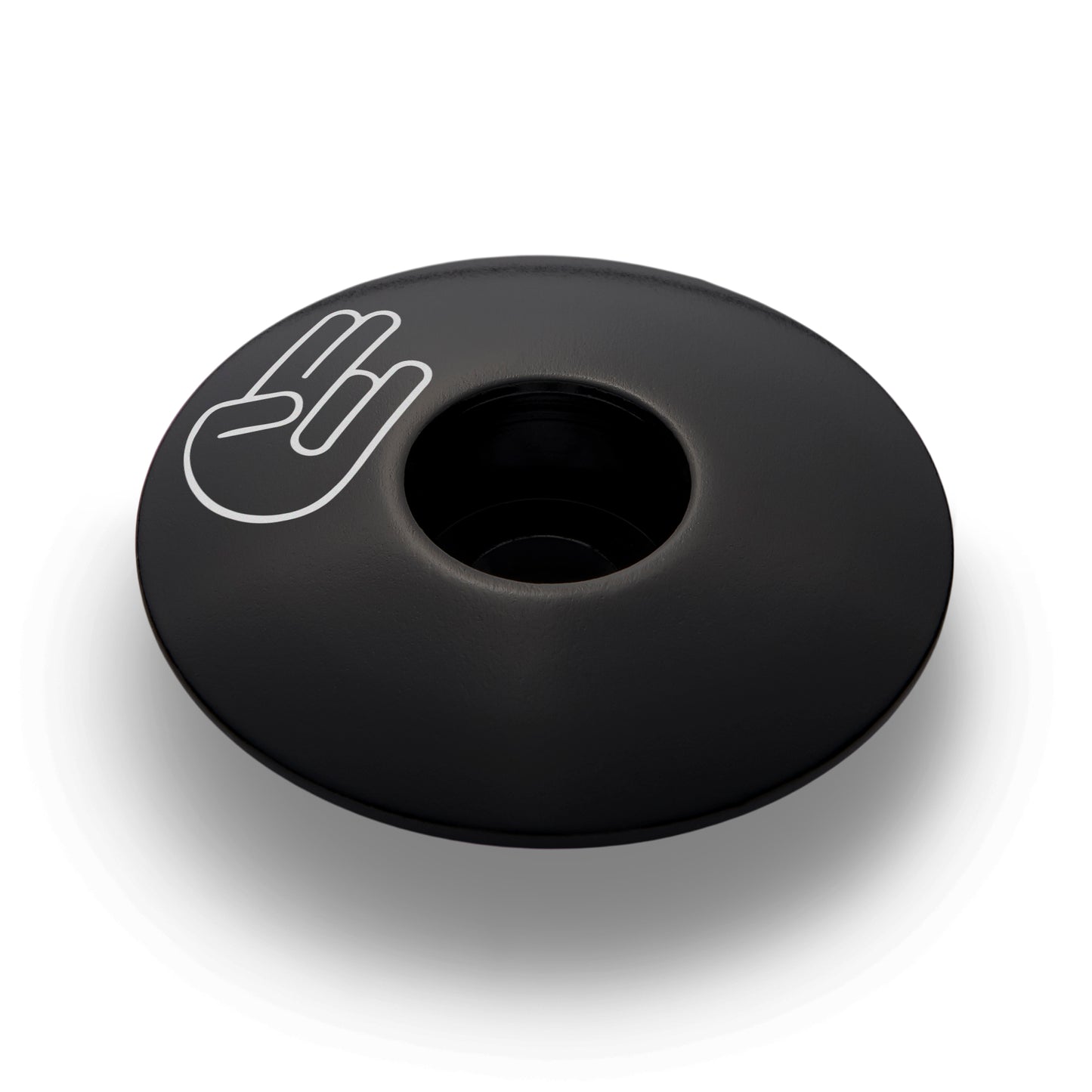 Black bike stems cap crafted from durable aluminum designed to ensure safe riding with a custom touch.