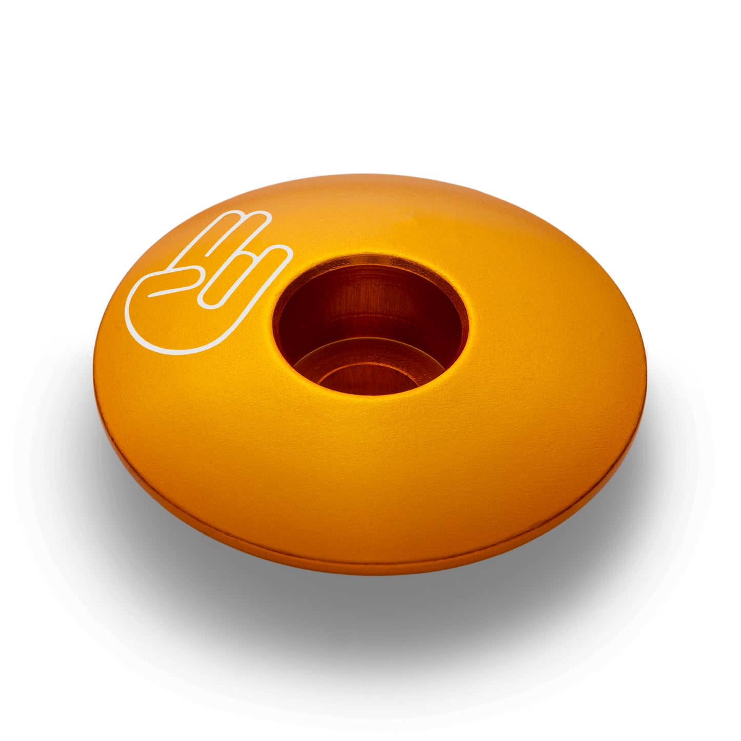Gold bike stem cap made of anodized aluminum a great choice for safety-focused cyclists.