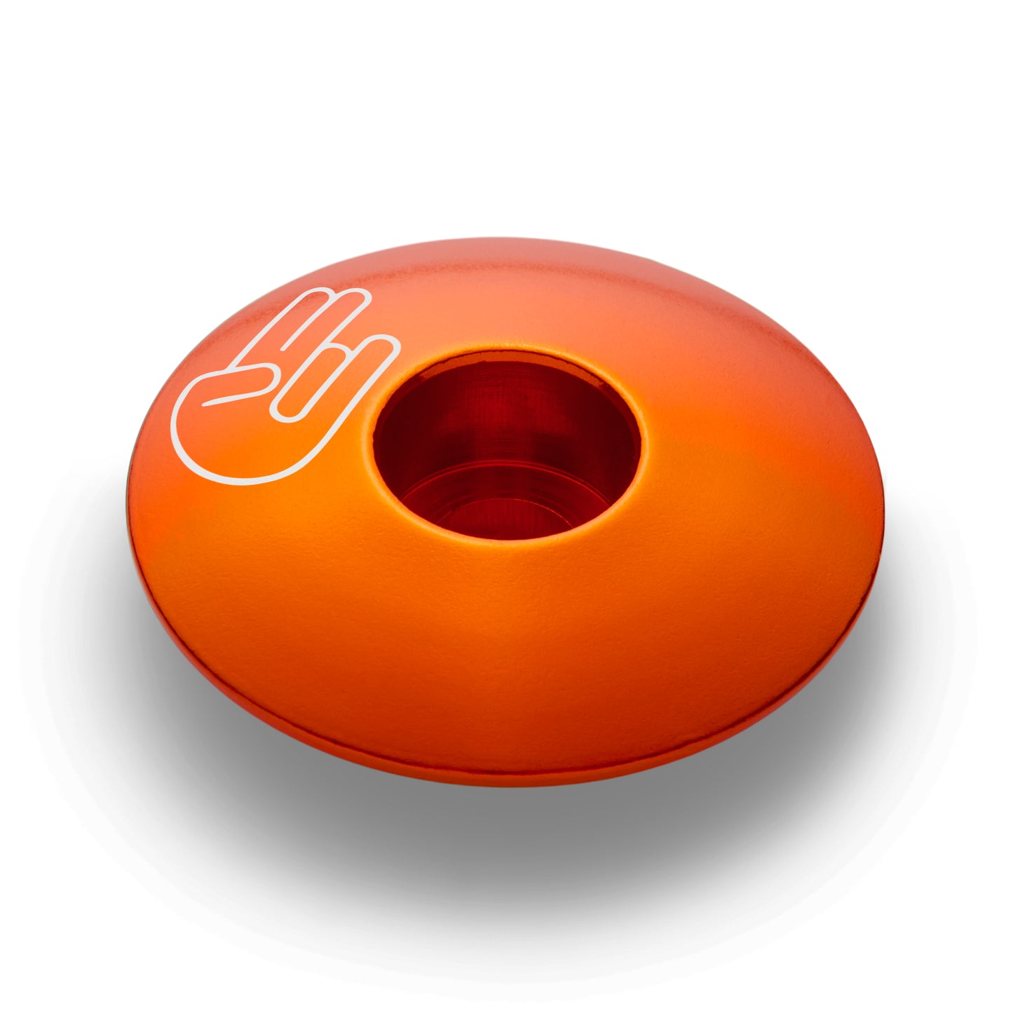 Orange bike stem cap made of anodized aluminum designed for safety and personalization.