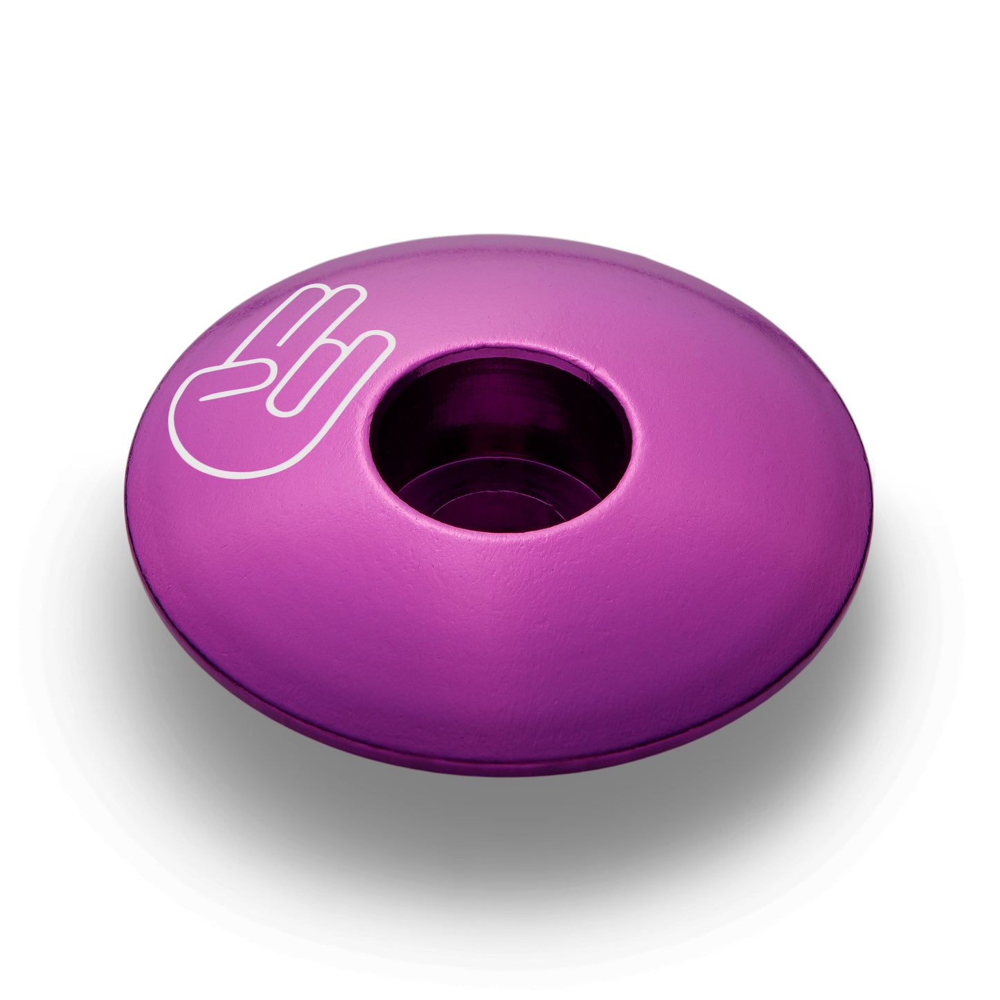 Purple bike stem cap made of anodized aluminum a custom addition for promoting safe riding.