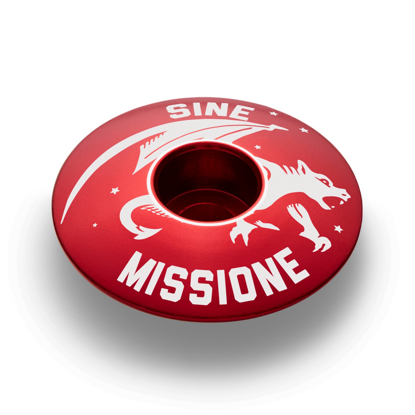 Red bicycle headset cap with Gargoyle design for personalized cycling components.