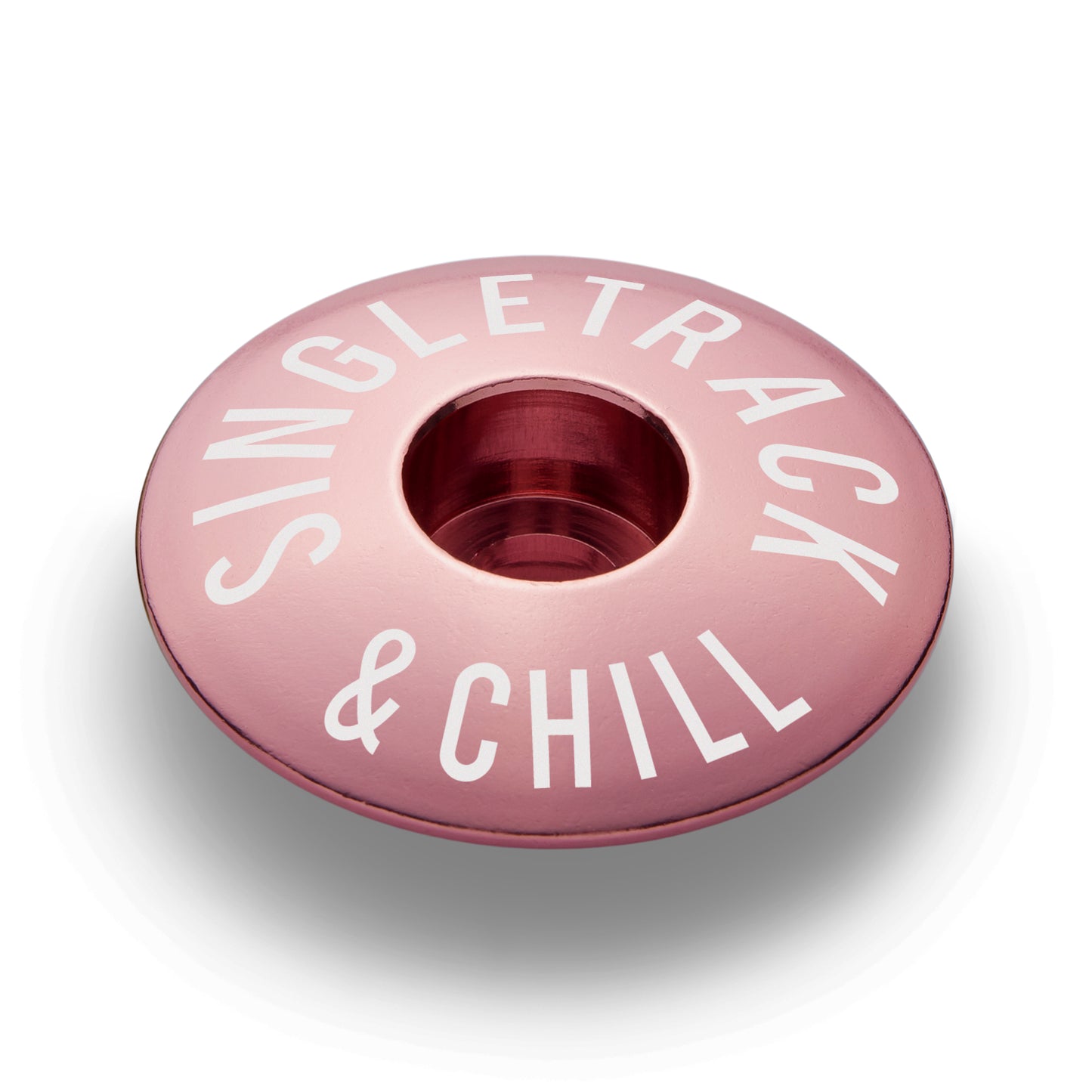 Pink bike stem cap made from durable aluminum fits 1 1/8" steerer tubes.