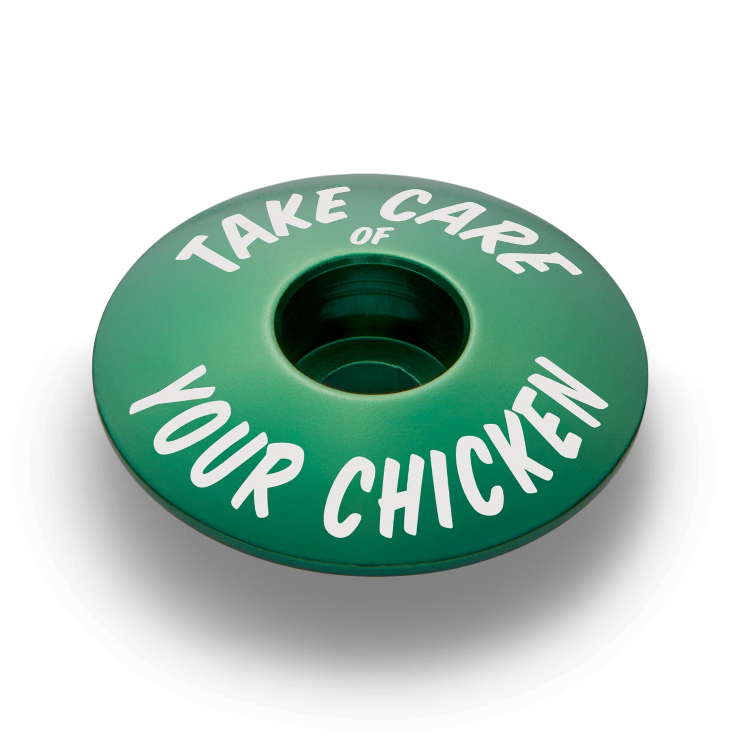 Dark green bicycle headset cap for 1 1/8 inch steerer tubes made from durable aluminum for bike customization.