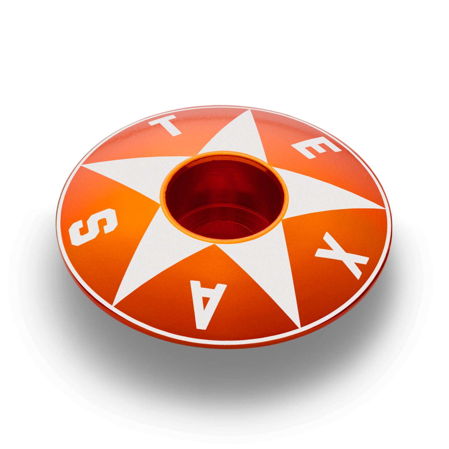 Orange bicycle headset top cover with a Texas-themed star and roundel.