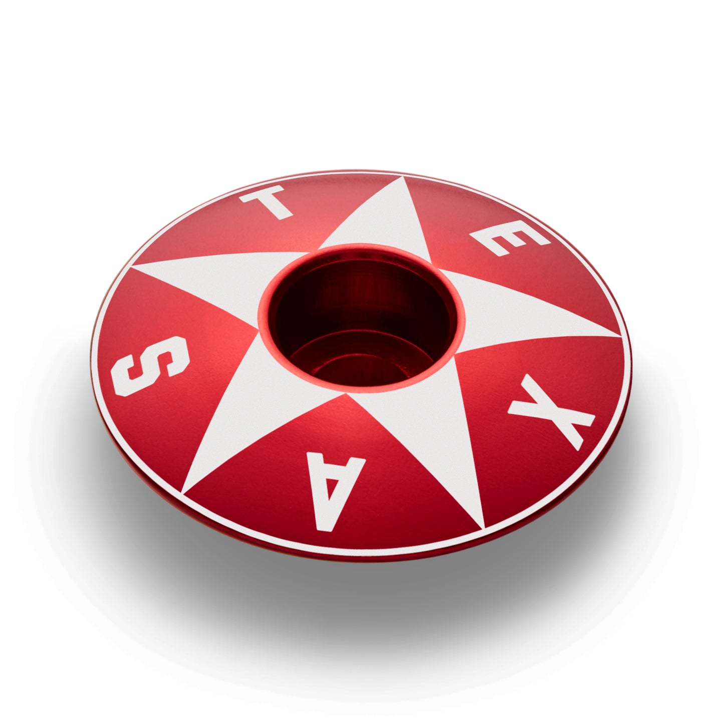 Red Texas bike stem cap with a star design and bold Texas lettering.