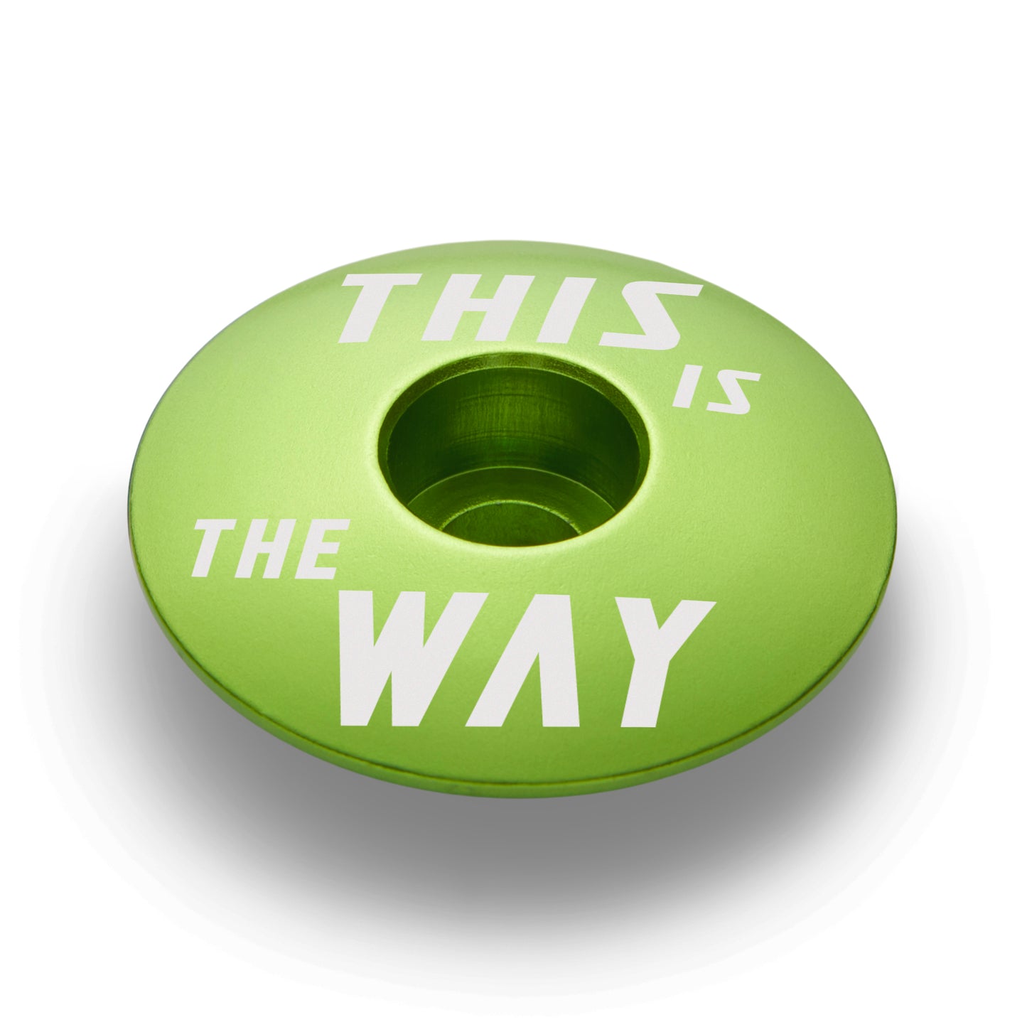Lime green stem cap for bikes made of 6061 aluminum fits standard 1 1/8" steerer tubes.