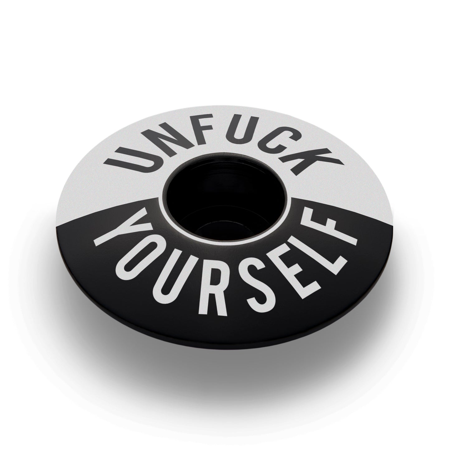 Black bike headset cap with UNFUCK YOURSELF design for 1 1/8-inch steerer tubes made from durable 6061 aluminum.