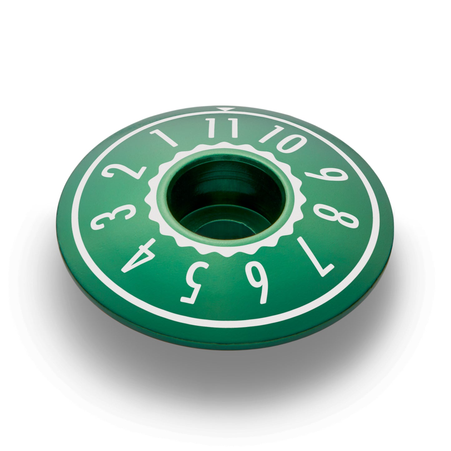 Green headset top cap for 1 1/8" bike stem, adding personality to your bike components.