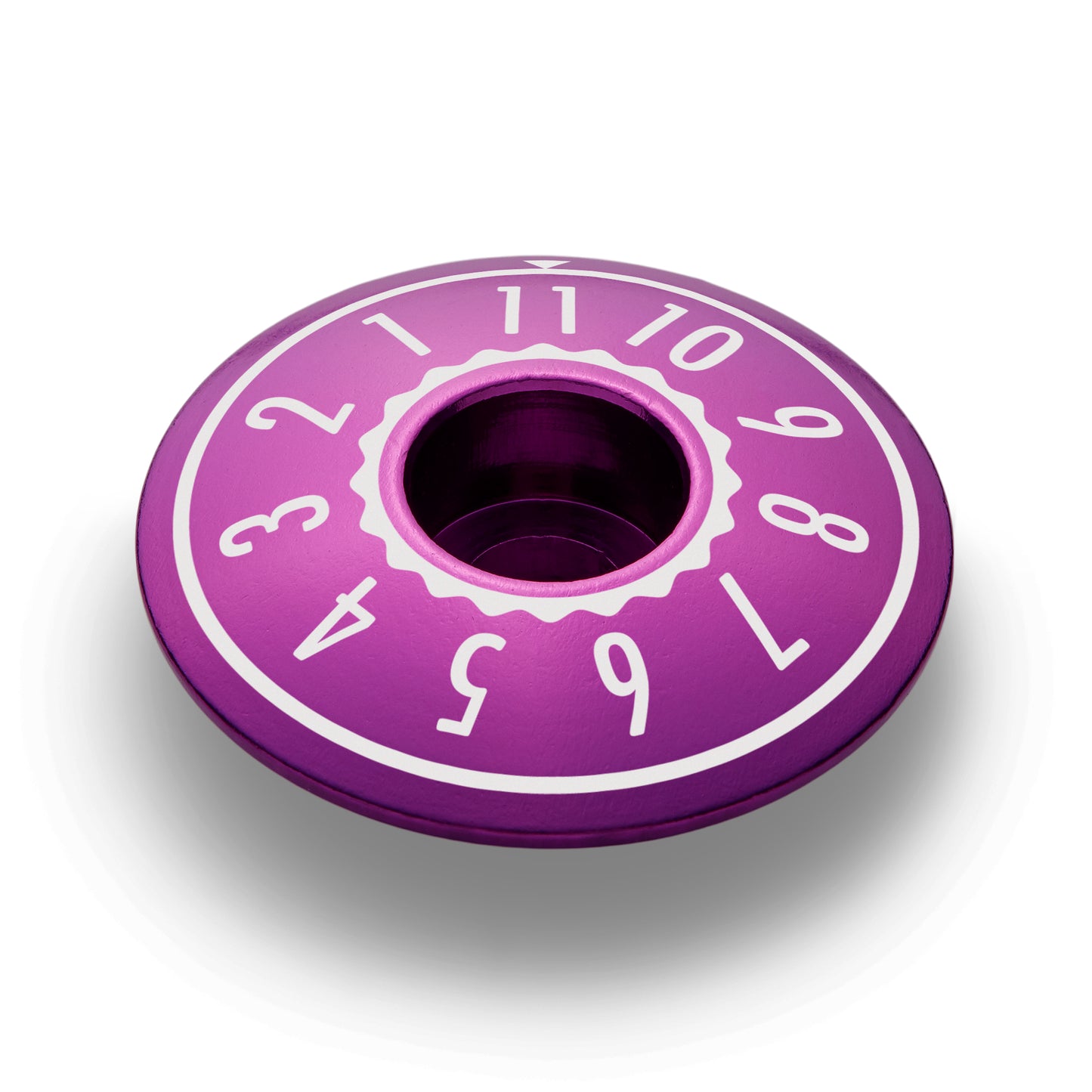 Purple bike top cap designed for 1 1/8" steerer tubes, ideal for mountain bike enthusiasts.