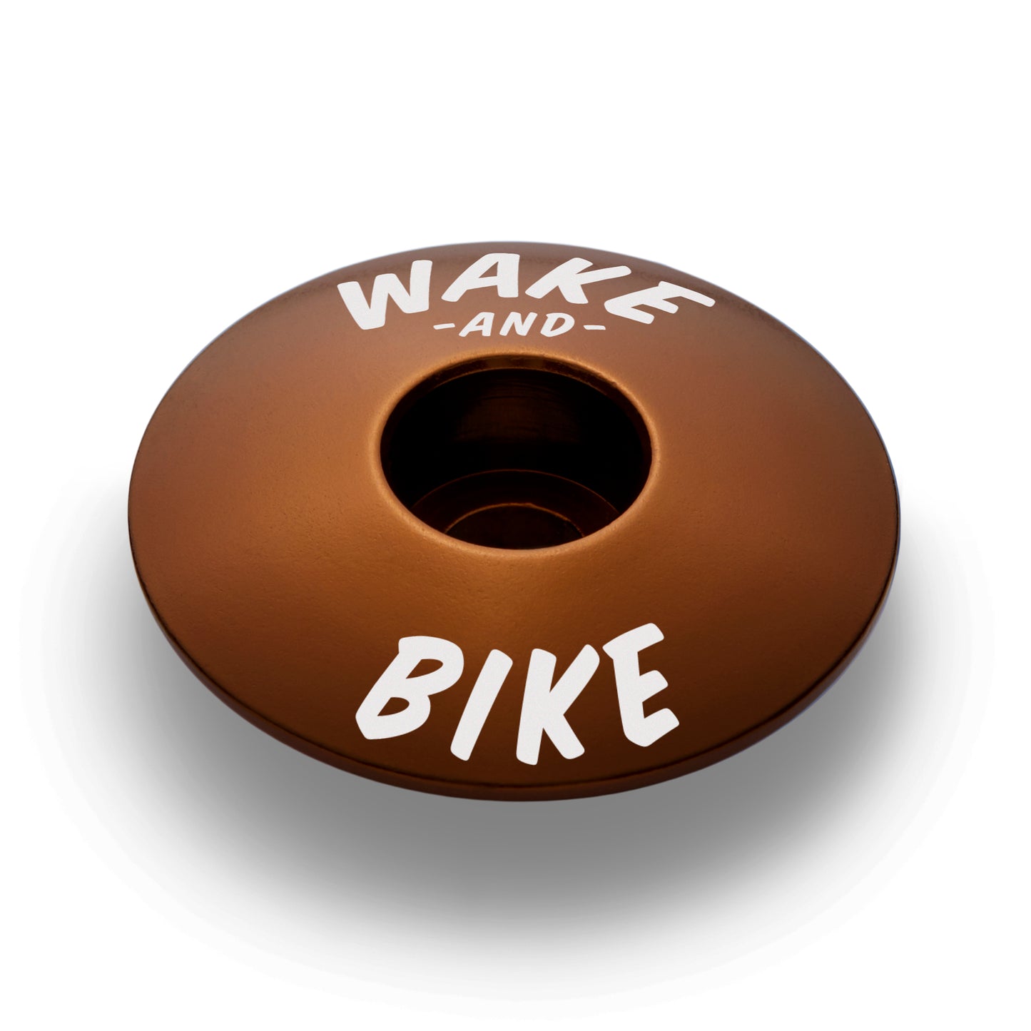 Brown bike headset cap designed for 1 1/8" steerer tubes offering a smooth cycling experience.