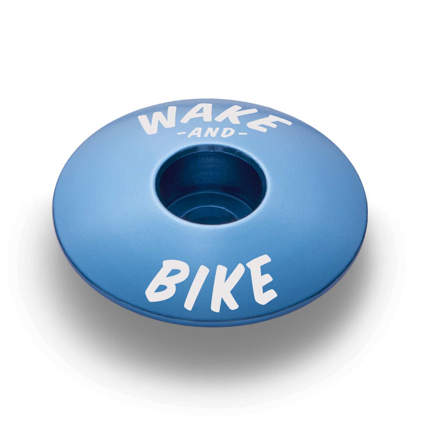 Light blue headset top cap for a functional and stylish upgrade to your bike setup.