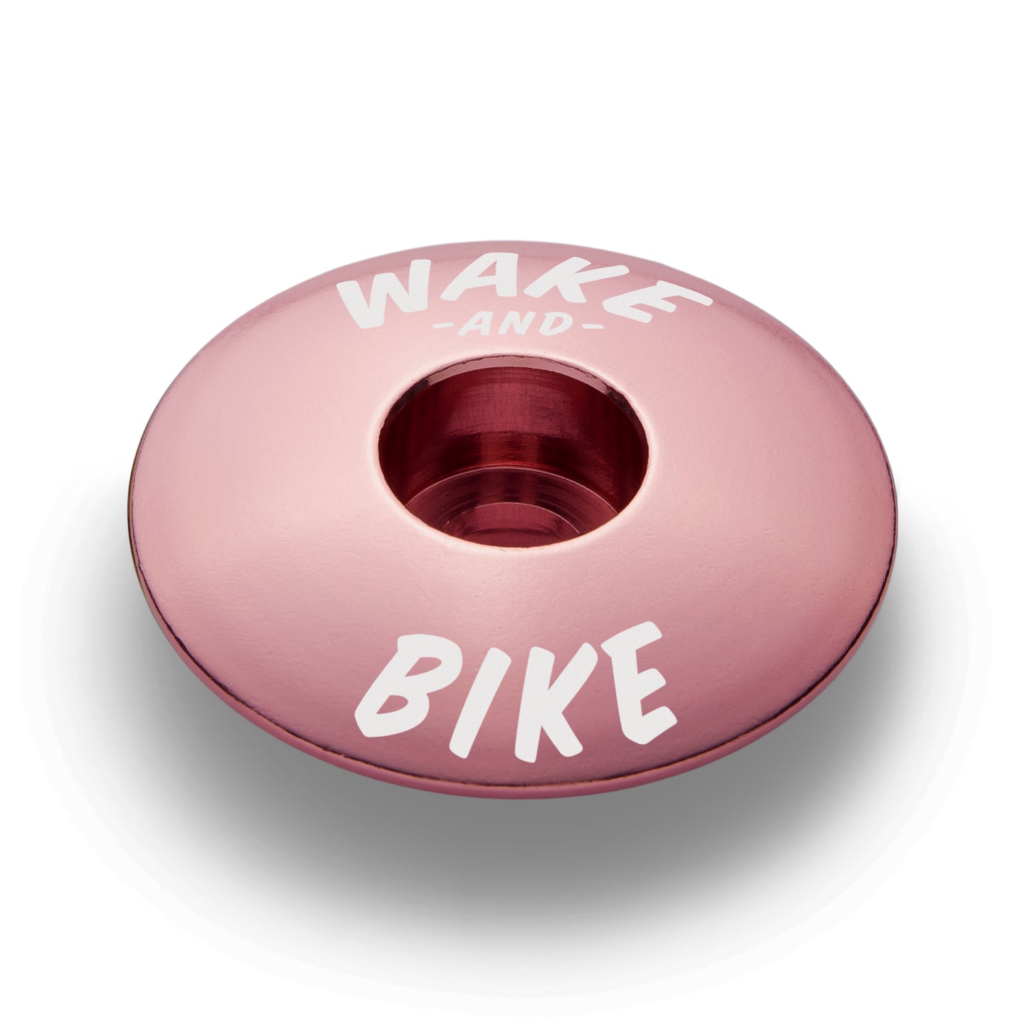 Pink stem top cap for a durable and colorful addition to your bike components.