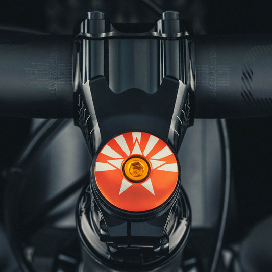 orange bike headset cap engraved with the Arizona flag for cycling enthusiasts.