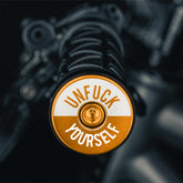 Bike bar end plugs gold designed for mountain bike handlebars.