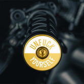 Bike bar end plugs gold designed for mountain bike handlebars.