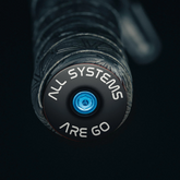 Black bicycle bar end plugs are designed for road and mountain bike handlebars with durable aluminum construction - Dispatch Bike