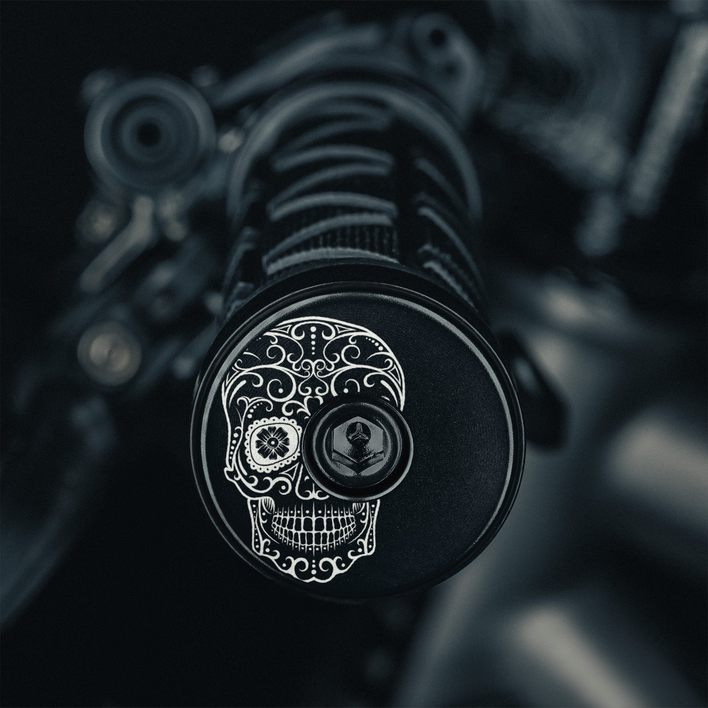 Black bicycle bar end plugs for road or mountain bike customization.