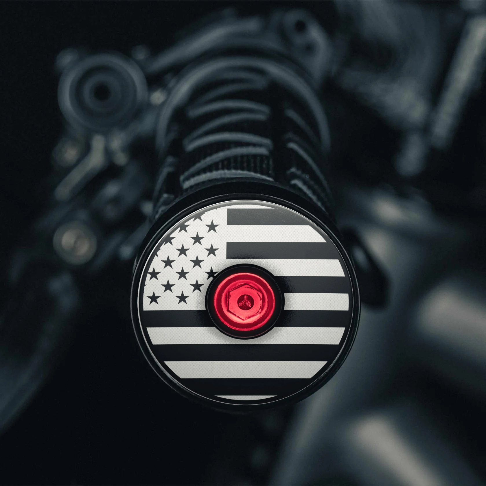 Black bicycle bar end plugs with American flag design for road and mountain bikes.