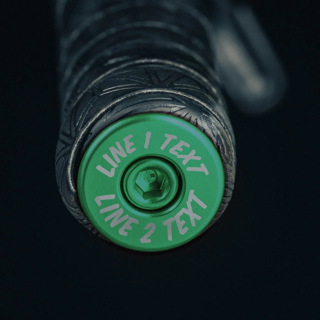 Dark green bar end plugs mountain bike set with matching headset cap and bolt.