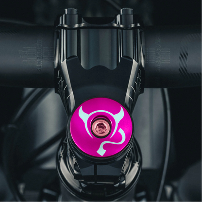 Hot pink bike top cap crafted from durable 6061 aluminum perfect for custom bicycle accessories.