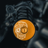 Gold bicycle bar end plugs for personalizing road or mountain bikes.