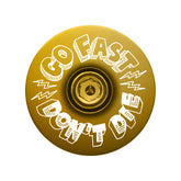 Gold custom bicycle headset cap accessory showcasing bold design and functionality for every ride.
