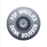 Gray bicycle headset cap crafted for a subtle yet customizable cycling experience.