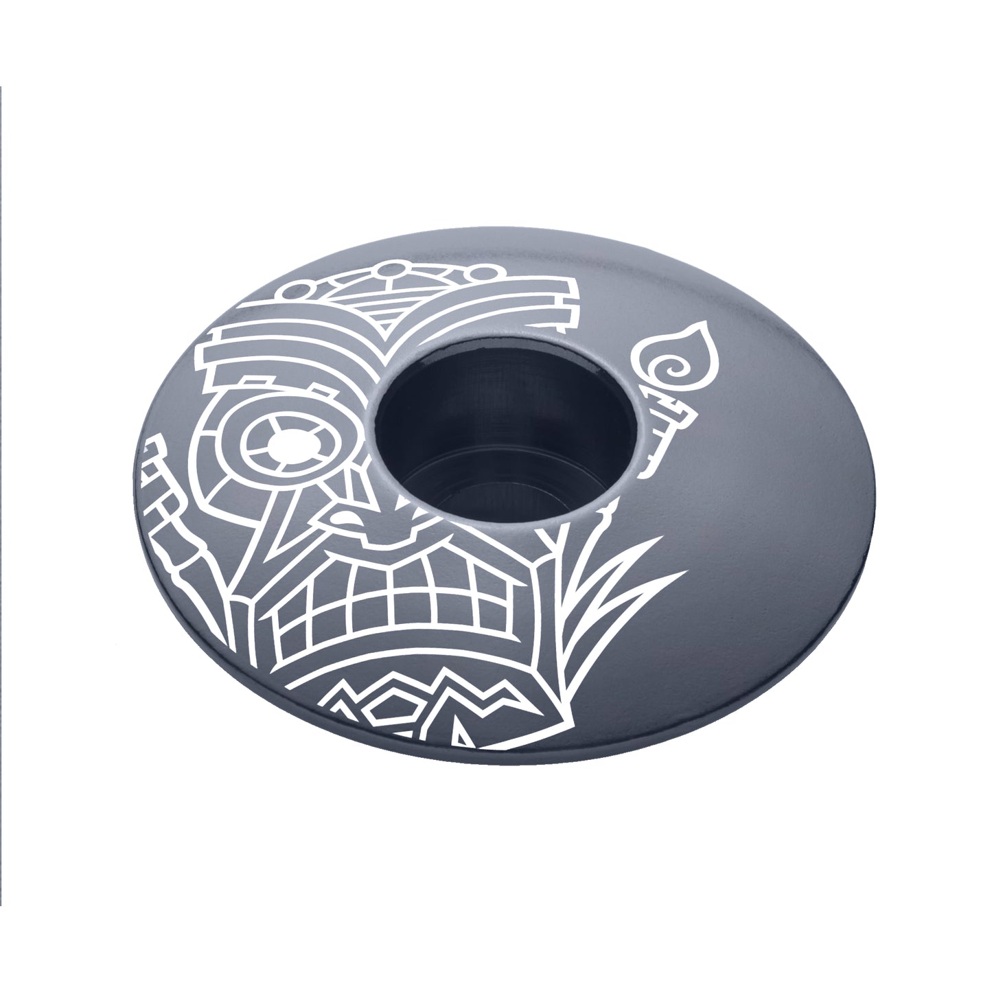 Gray cycling top cap with a tiki-inspired design crafted for 1 1/8-inch steerer tubes.