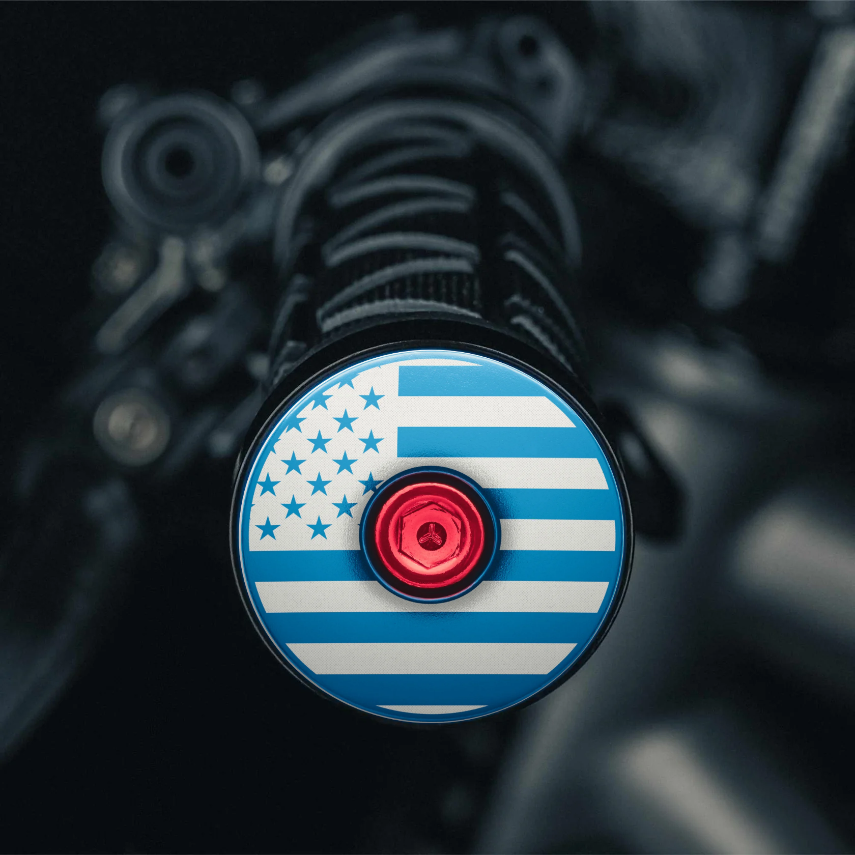 Light blue road bicycle bar end plugs with American flag.