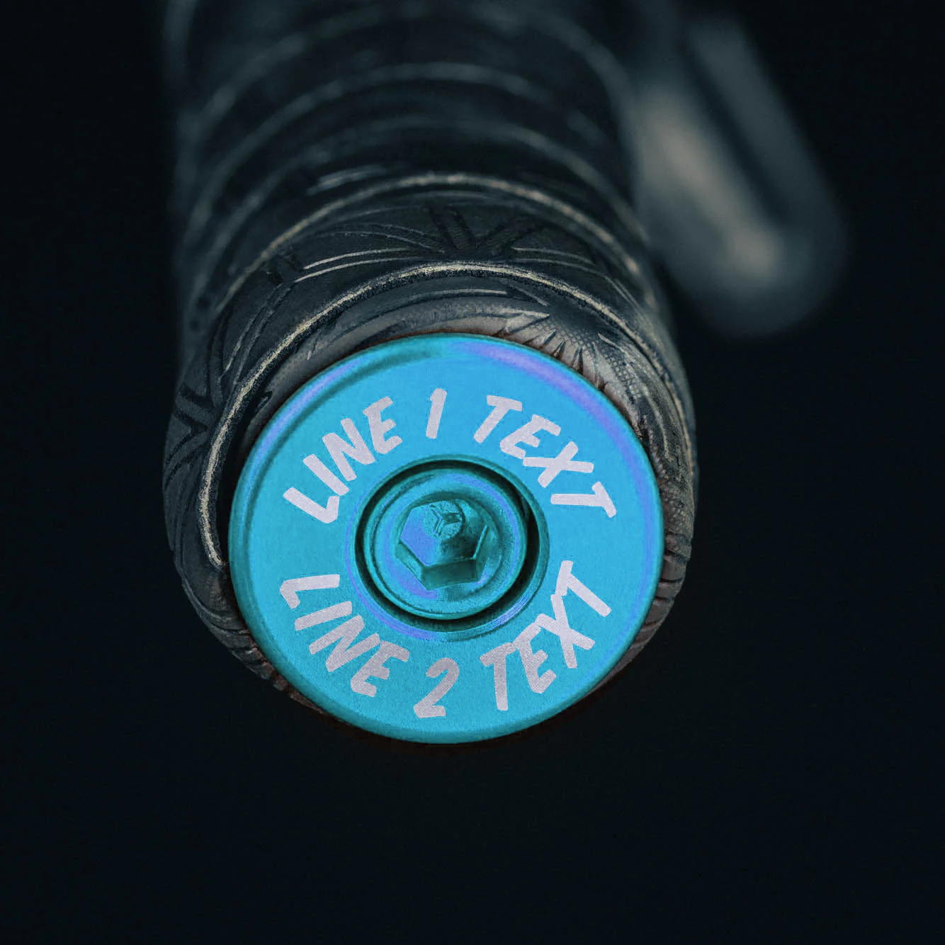 Light blue road bicycle bar end plugs with matching headset cap and bolt for customization.