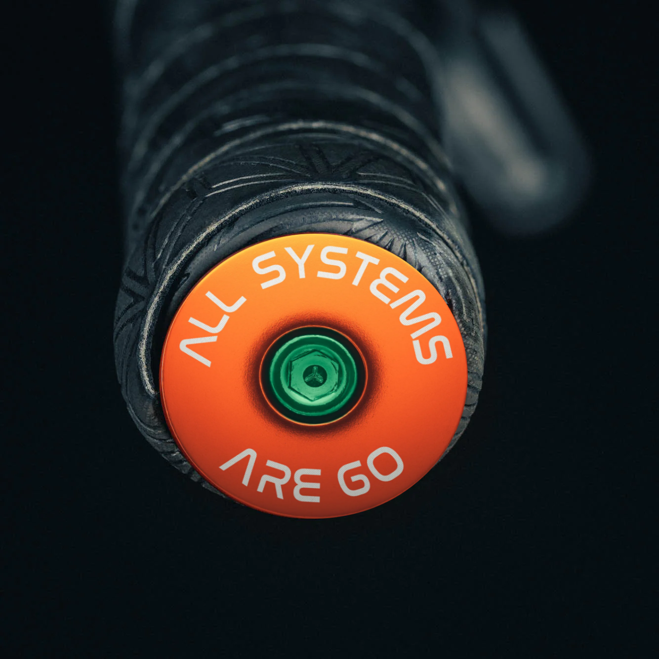 Orange bar end plugs are road bike accessories offering a perfect fit for drop and flat handlebars.