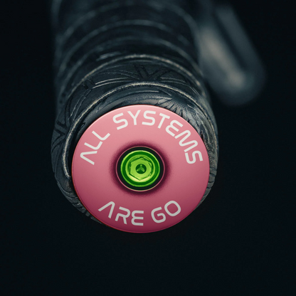 Pink bicycle bar end plugs for road and mountain bike handlebars in a vibrant and durable design.