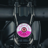 Hot Pink Bicycle Headset Cap precision-designed for 1 1/8-inch steerer tubes in anodized aluminum.