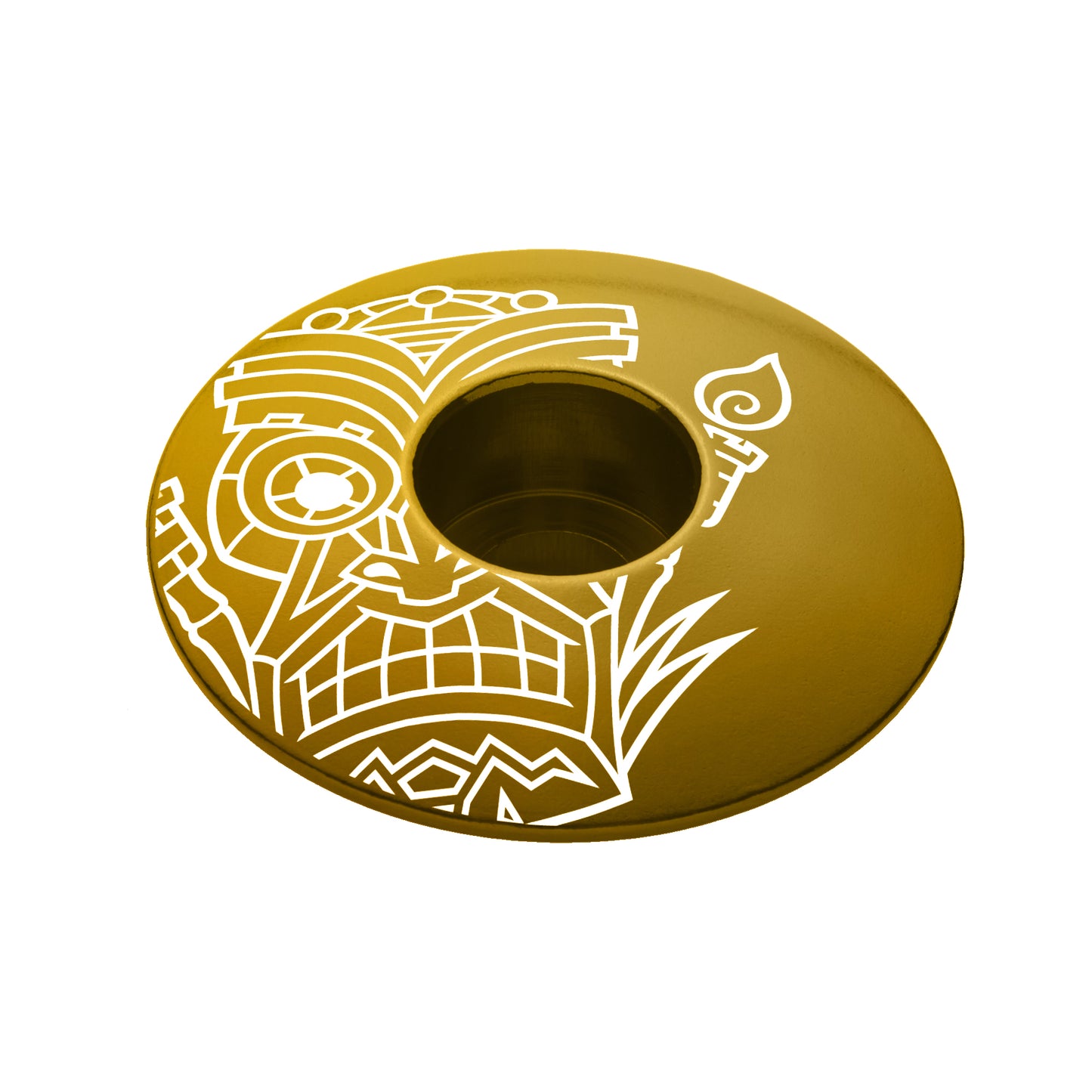 Gold bike headset top cover with a tiki design made of lightweight and durable aluminum.