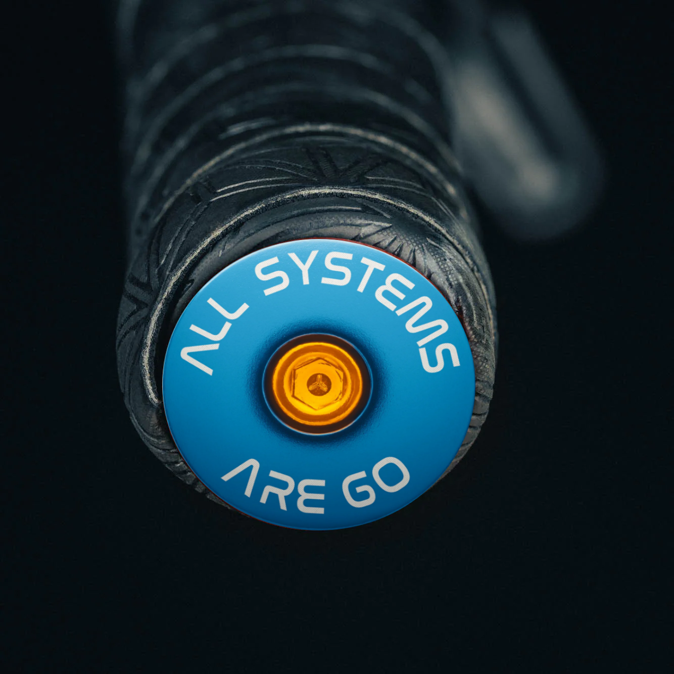 Light blue bike bar end plugs for road and mountain bikes with easy installation.