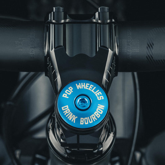 Pop Wheelies Drink Bourbon Bicycle Headset Cap for a sleek customization of mountain or road bikes.