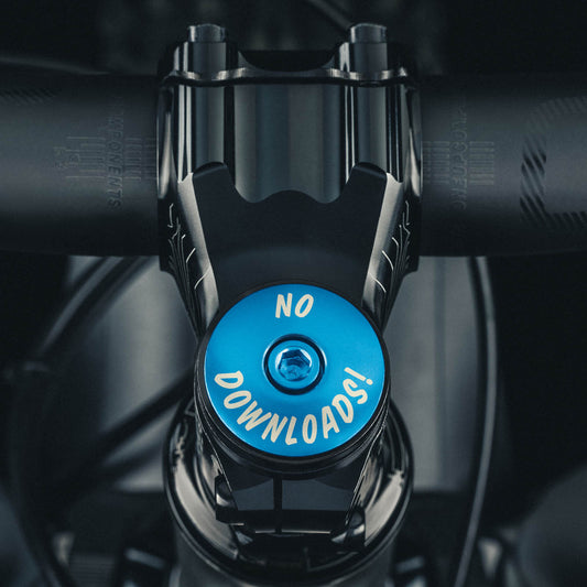 Blue bike headset cap with 'Grip and Rip' design offers a simple and durable upgrade.