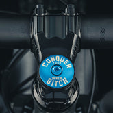 Conquer Your Inner Bitch Custom Vibrant blue bike stem cap designed for cycling enthusiasts seeking personalized bike components.