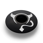 Black bike stem cap designed for 1 1/8" steerer tubes and made from durable 6061 aluminum.