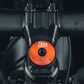Orange bike headset top cover that brings a bright and functional addition to your bike.